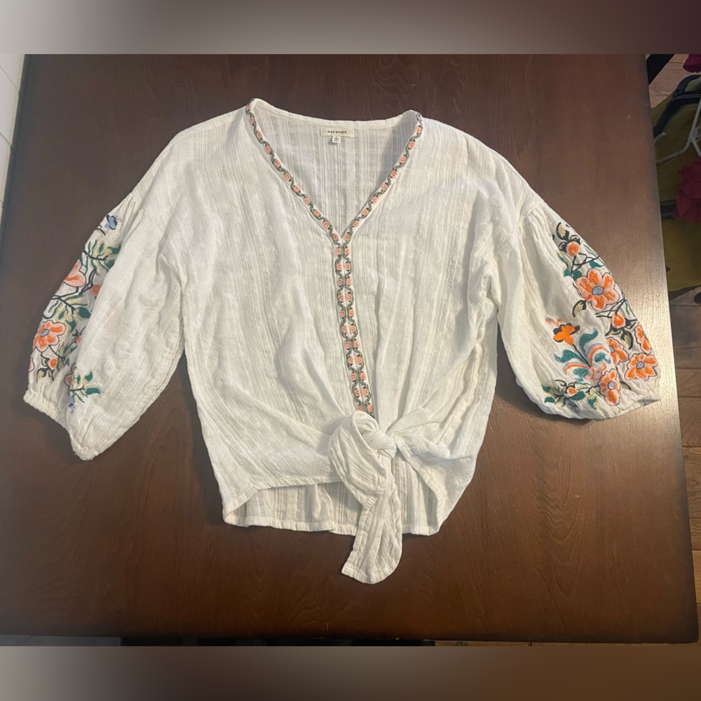 Max studio, size large, white with floral design on sleeves as down the center